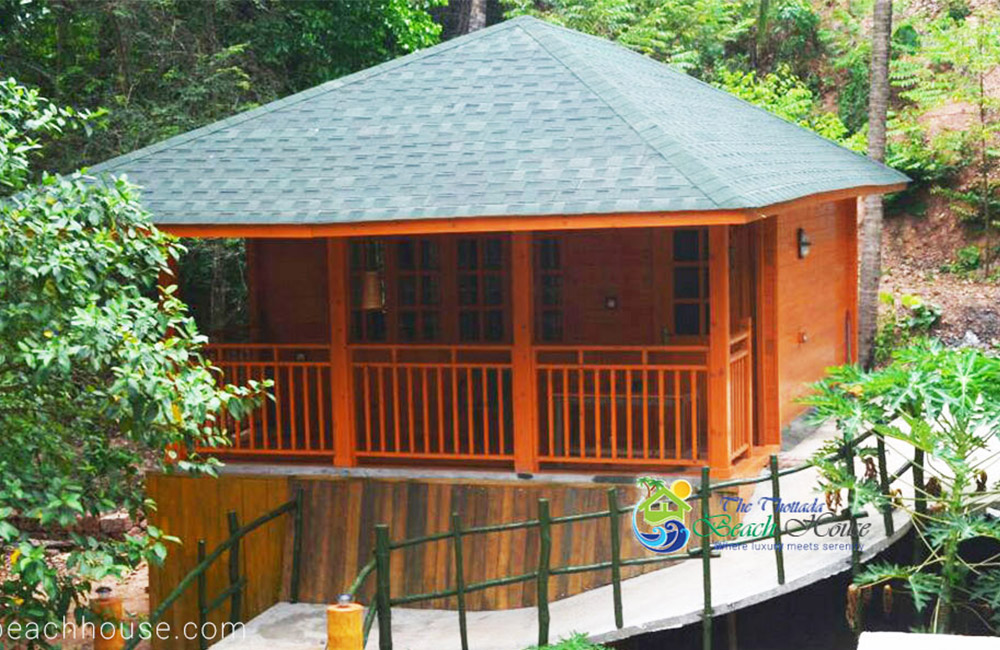 thottada beach house wooden hut