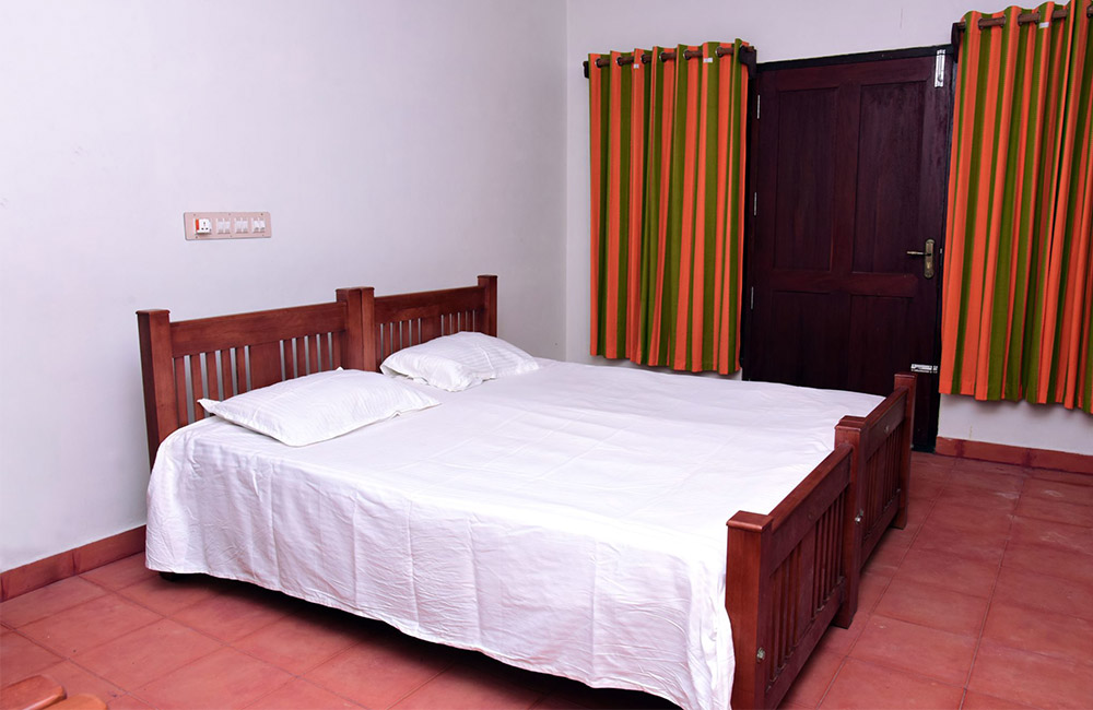 Thottada-Beach-House-Heritage-Home-Interior-Deluxe-Bedroom-k